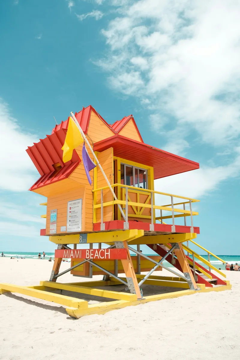 Colorful yellow and red lifeguard house on Miami Beach